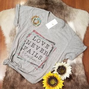 Love Never Fails Unisex T-shirt
